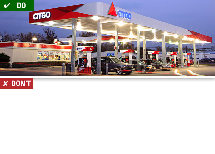 The location is well lit with functioning lights on the canopy and building exterior.