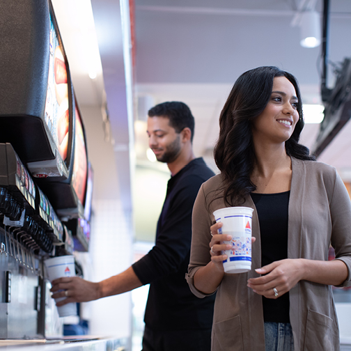 Woman holding CITGO cup